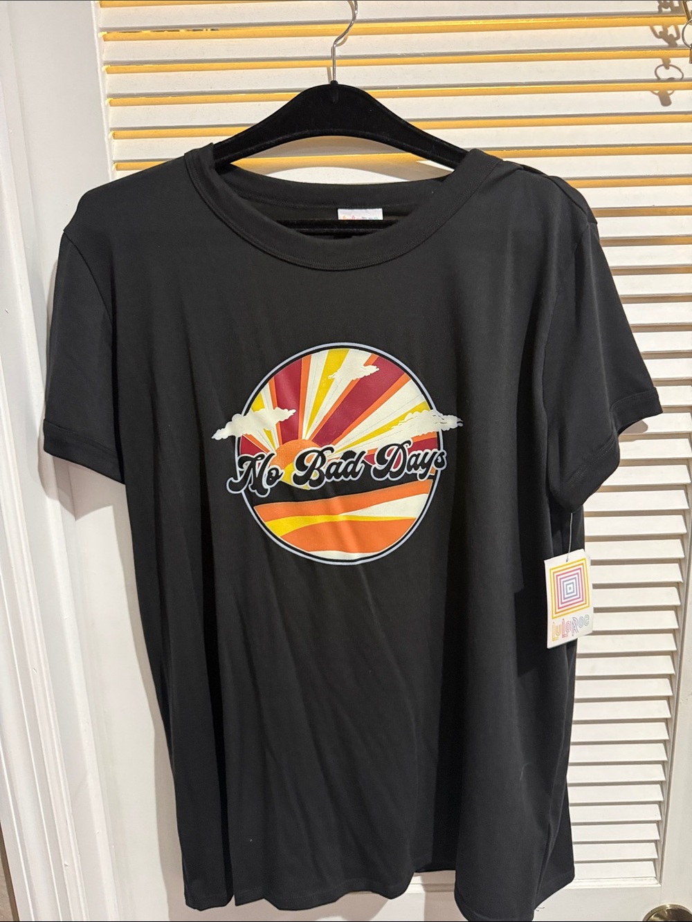 LuLaRoe Black Tee with Multicolor Logo Tag